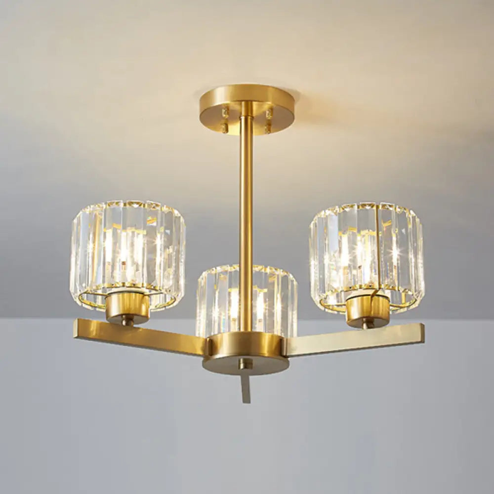 Chandeliers with Frosted Glass for a Softer Light DiffusionChandeliers with Frosted Glass for a Softer Light DiffusionSleek 3-Light Gold Pendant Chandelier with Cylinder Tri-Prism Crystal Accents - Simplicity in Design